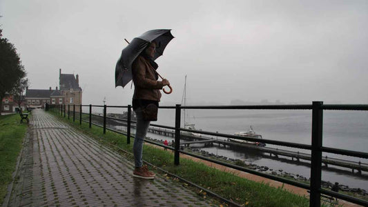 woman on a cloudy boardwalk
