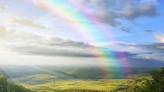 rainbow over a valley