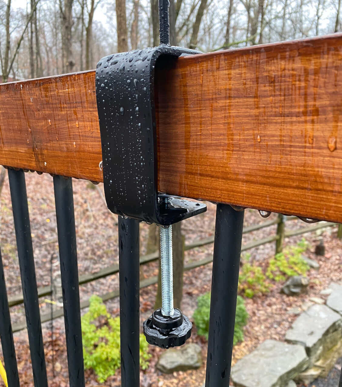 Rain Gauge Clamp Mount on Wood Rail