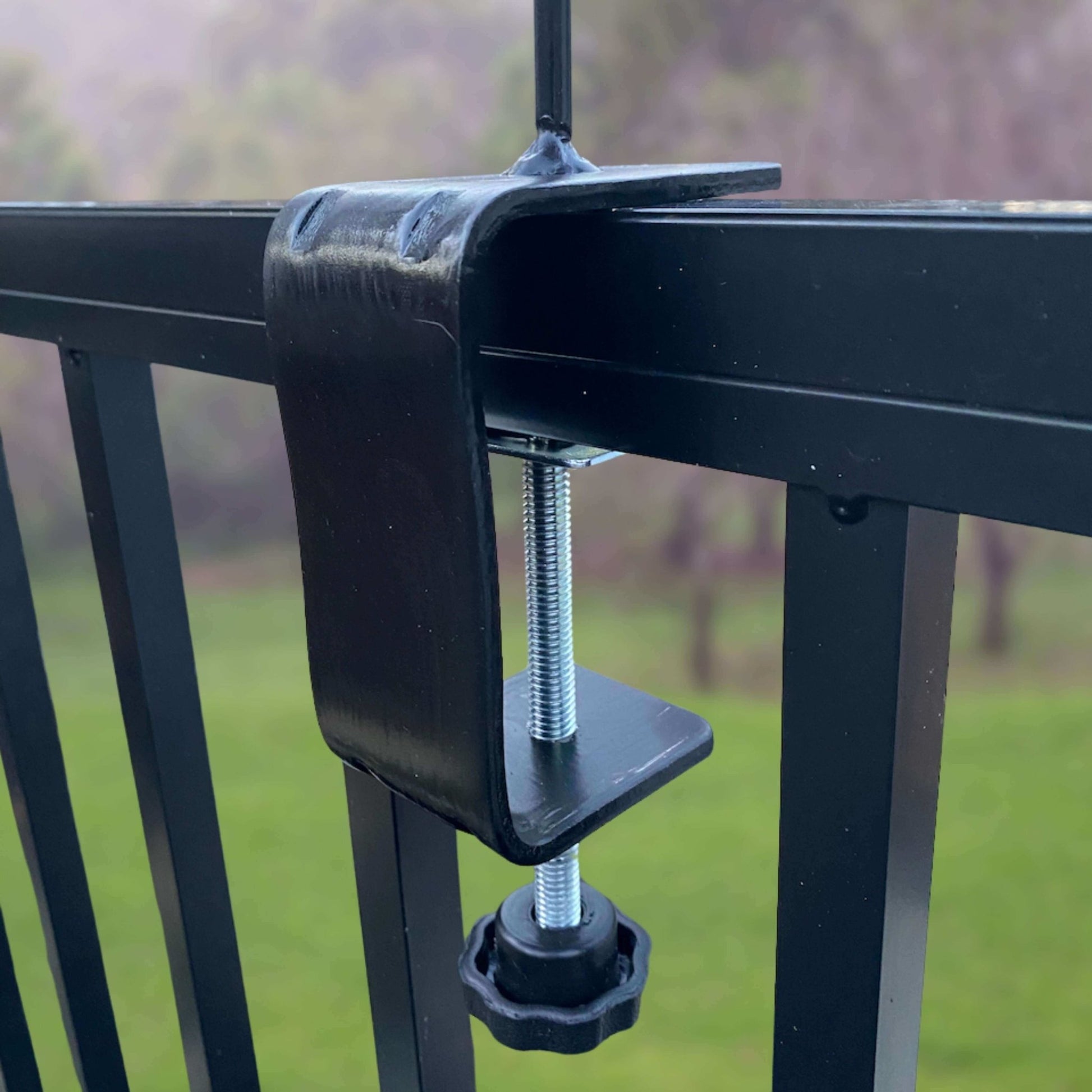 Rain Gauge Clamp Mount on Metal Railing