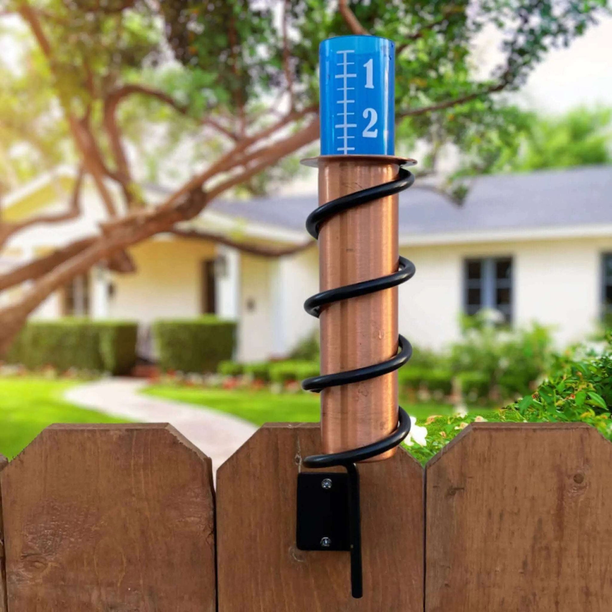 Fence Mount Copper Rain Gauge On Panel Fence
