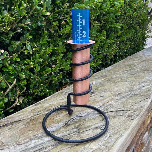 Copper Rain Gauge on Patio Wall