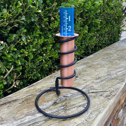 Copper Rain Gauge on Patio Wall