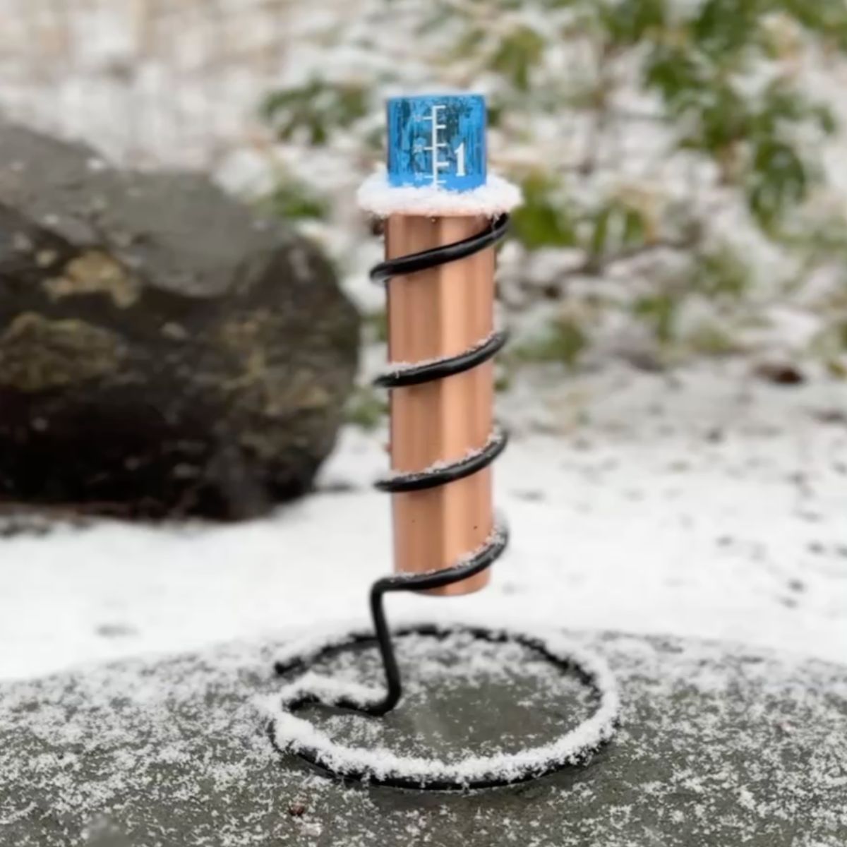 Tabletop Rain Gauge In Light Snow