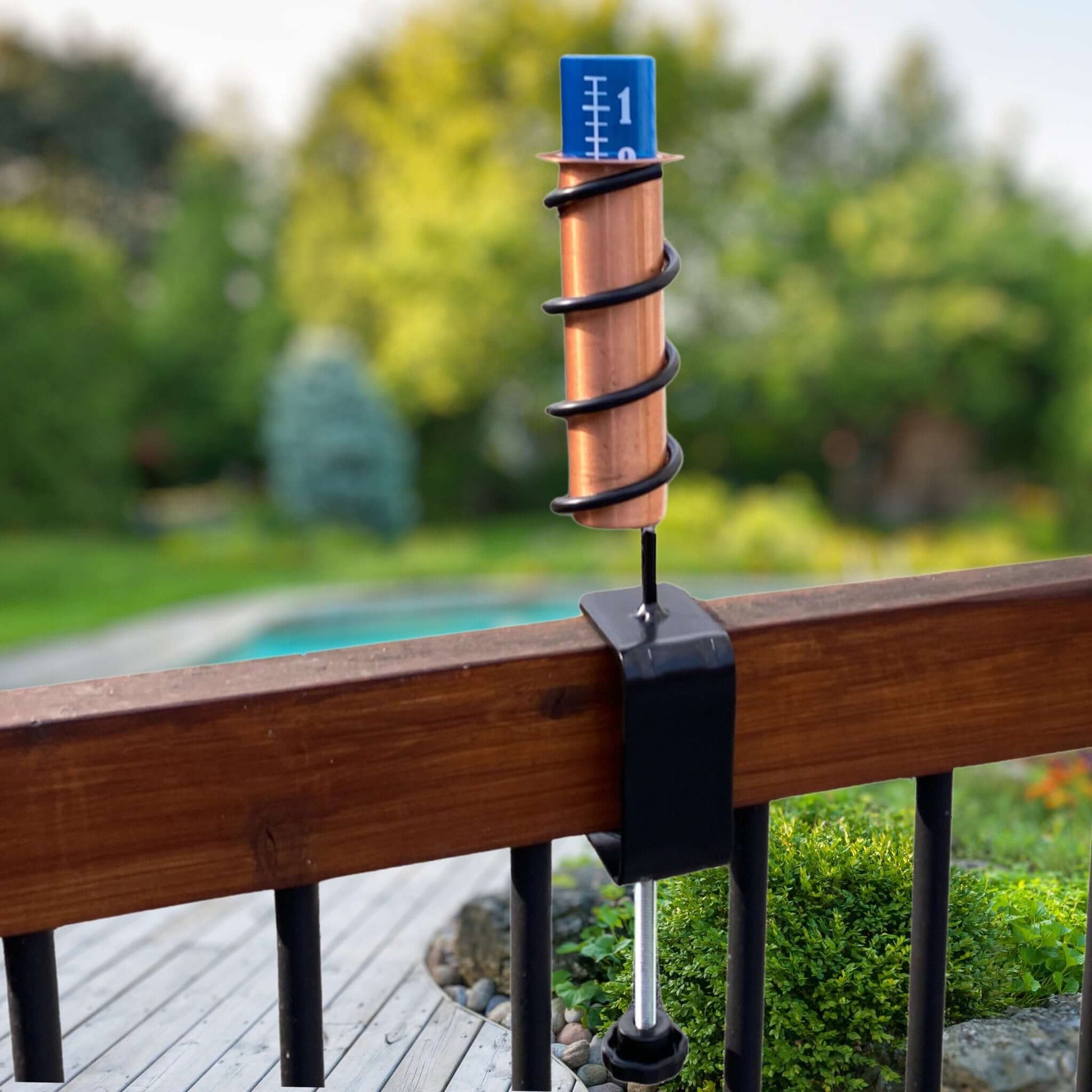 Solid Copper Deck Mount Rain Gauge Installed On Wood